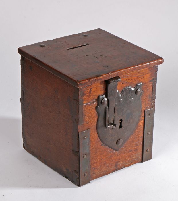 An early 17th century oak and iron-bound alms box, English, circa 1620, of show dove-tail boarded - Image 4 of 4