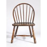 A 19th Century ash and elm stick back Windsor chair, probably West Country, with hooped spindle-