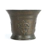 A 17th century leaded-bronze mortar, Norfolk, the flared body with cords below the lip and cast