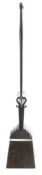 A fine early 18th century wrought iron peel, with scrolled decoration,  the tapering stem with a