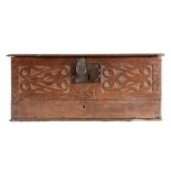 A Charles II oak boarded box with base drawer, circa 1680, the rectangular top enclosing storage