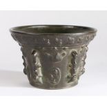 A small 17th century lead bronze mortar,  Lyon, French, the rim cast with fleur de lys, the body