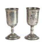 A very near pair of 18th century pewter chalices, circa 1730-70 Each having a tulip-shaped bowl with
