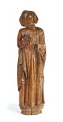 An interesting 15th/16th century carved walnut figure of male saint, circa 1490-1520, probably
