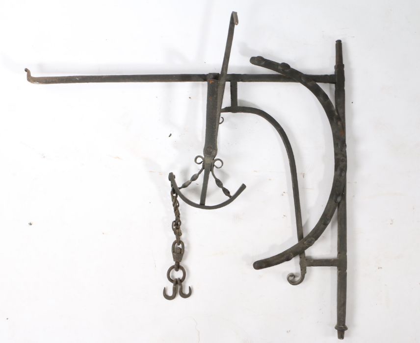 An 18th century iron chimney crane, the corner bracket with an arched adjusting arm, the crane with - Image 2 of 2