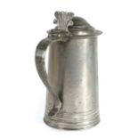 A good and well-documented straight sided pewter flagon, York, circa 1725 Having a tapering drum
