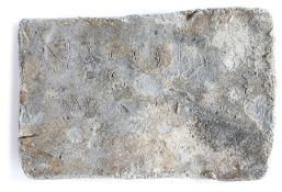 An intriguing small Roman lead 'curse' panel, etched with a written curse, 60mm long, 40mm high -