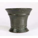 An early small 17th century bronze-alloy mortar, English, with cord below the flared rim,  wide