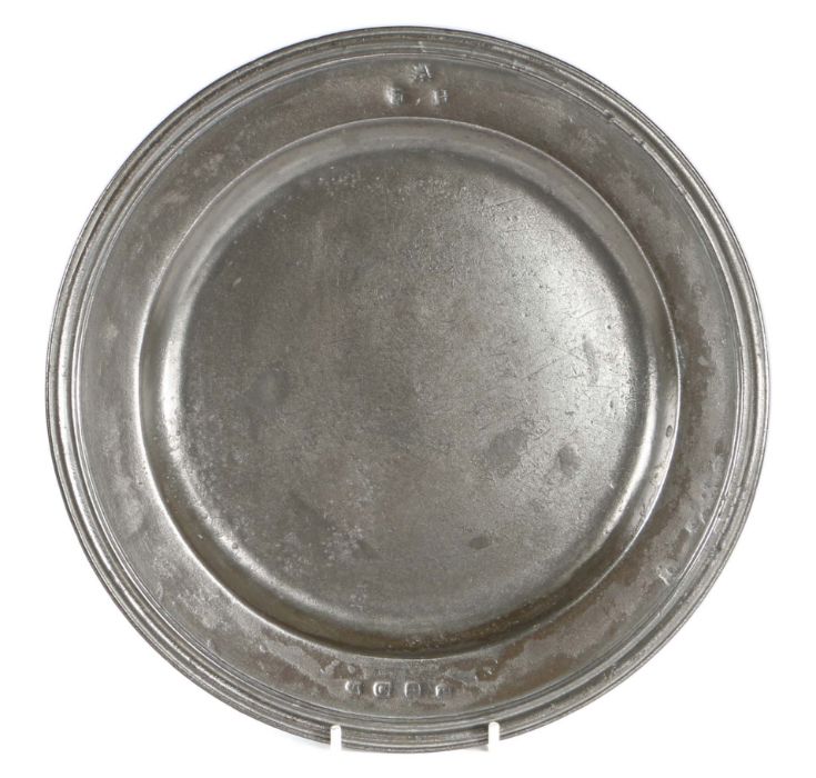 A late 17th century pewter multi-reed rim-plate, English, circa 1685 With hallmarks to front rim and
