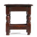 An exceptionally rare Charles I padouk stool, circa 1630, the square top with triple-reeded edge,