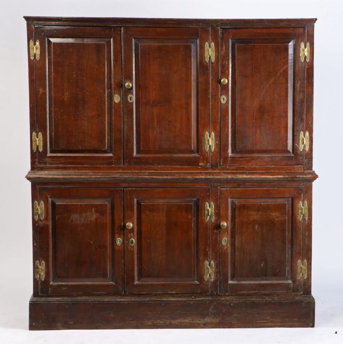 A George III oak cupboard, circa 1770, having six fielded panelled doors, a waist moulding and - Image 2 of 2