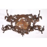 Coalbrookdale: an equine cast iron coat rack, centred by the bust of a horse,  framed by a large