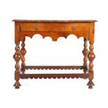 A rare William & Mary yew side table, the crossbanded rectangular top above a frieze drawer and