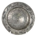A 16th century pewter spice plate Having a single reeded rim with triangular beaded under edge,