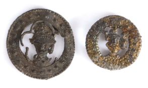 Two 14th century pewter pilgrims' badges, both with the bust of a male, one Thomas Becket, each