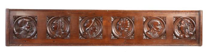 A long walnut Romayne-type head carved panel, French Of six portraits bust, each carved within a