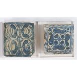 Two 16th century tiles, the first a rose tile, Valencia, Spain, 9cm wide, the second of scroll