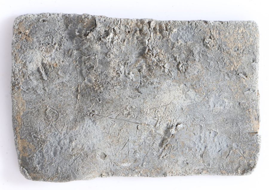 An intriguing small Roman lead 'curse' panel, etched with a written curse, 60mm long, 40mm high - - Image 2 of 3