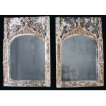 A pair of Gothic-style  mirrors, possibly Italian, 18th century and later, each with arched plate
