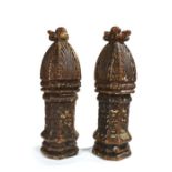 A pair of 16th century oak and polychrome-decorated newel-post finials. Each having a cloister-vault
