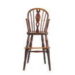 A mid -19th century ash and fruitwood high chair, Thames Valley, the hooped back with roundel