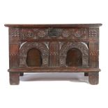 A GOOD ELIZABETH I JOINED OAK COFFeR, CIRCA 1590 Having a twin-boarded lid with double-reeded