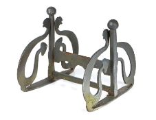 A 19th century iron boot scraper, with central bar, ball terminal upright and scroll brackets, 38cm