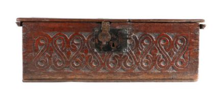A mid-17th century oak boarded box, English, circa 1650, with rectangular  hinged lid, the front