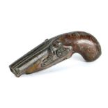 An early 19th century pewter snuff box in the form of a flintlock pistol, circa 1815 With traces
