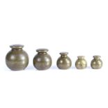 A Victorian set of graduated brass weights, 7lb, 4lb, 2lb, 1lb, 1lb, of globular form, marked in