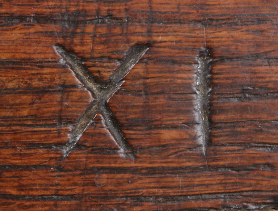 An early 17th century oak and iron-bound alms box, English, circa 1620, of show dove-tail boarded - Image 3 of 4