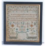 A 19th century needlework sampler by Elizebe Courts age 6 years, with alphabet and numbers above a
