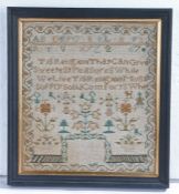 A 19th century needlework sampler by Elizebe Courts age 6 years, with alphabet and numbers above a