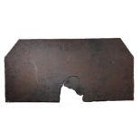 A large William & Mary iron fire back, the rectangular back with canted corners, upper centred by