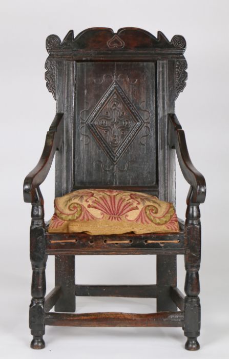 Charles II joined oak panel-back open armchair, Yorkshire, circa 1670, the back panel carved with - Image 3 of 6