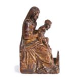 A late 15th/early 16th century carved oak and polychrome figure of the Madonna and Child, North