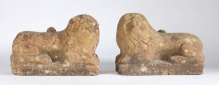 A fabulous pair of late 15th century, or possibly earlier, carved sandstone animals, a lion and