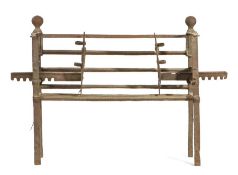 AN 18TH CENTURY WROUGHT IRON BAR-GRATE, WITH ADJUSTABLE CHEEKS The front of five bars, the