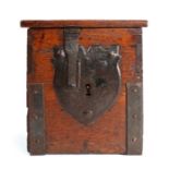 An early 17th century oak and iron-bound alms box, English, circa 1620, of show dove-tail boarded