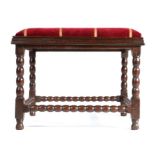 A Charles II oak and upholstered stool, circa 1680, with a drop in padded seat upholstered in