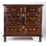 A small Charles II oak chest of drawers, circa 1680 Having a twin-boarded top with applied moulded