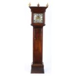 A George III oak longcase clock, Wm Granshaw, the cornice above a square glazed hood flanked by