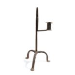 English iron table rush light and candle holder, circa 1770-1800, the nips above a straight stem and