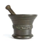 A MID-17TH CENTURY LEADED-BRONZE MORTAR, BY THE WHITECHAPEL FOUNDRY, LONDON Cast to the waist with a