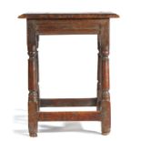 Charles II oak joint stool, the rectangular ovolo edge moulded top above a run-moulded frieze, on