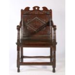 A museum deaccessioned Charles II oak panel-back open armchair, Lancashire, circa 1670 The back