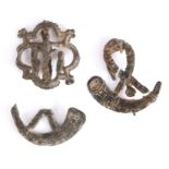 A 14th century pewter pilgrim's badge, designed as Christ on the cross within a barbed quatrefoil