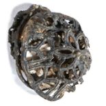 A 14th century pewter pilgrim's rattle, the compressed rattle containing the original crushed
