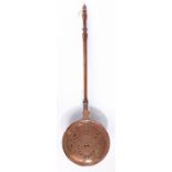 A 19th century copper and fruitwood warming pan, the pierced lid with a pair of birds either side