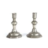 A pair of small pewter candlesticks Probably William & Mary, circa 1690 Each having a cylindrical